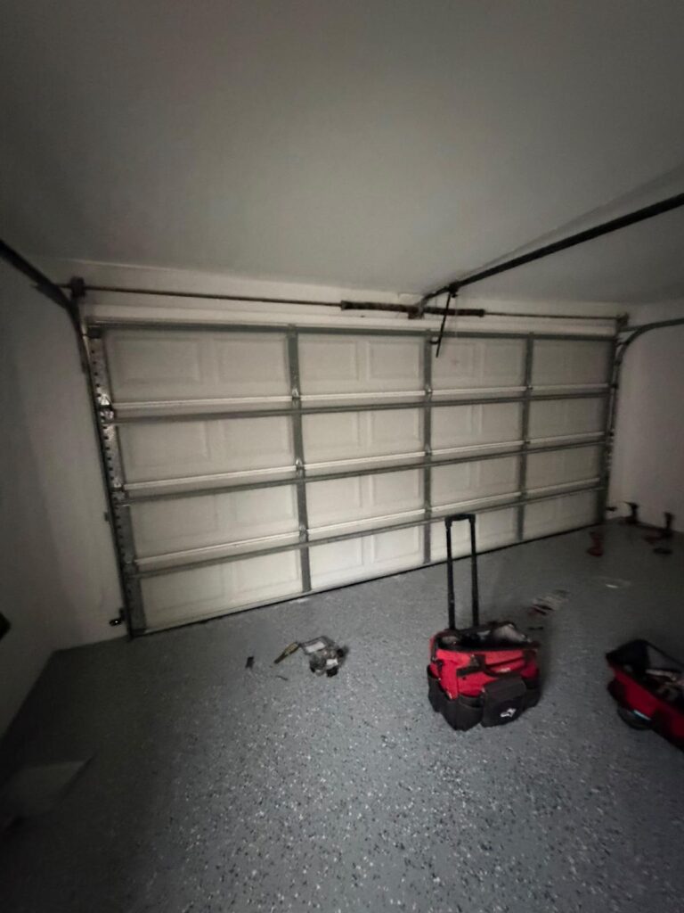 Broken garage door spring repair near Portland Ave